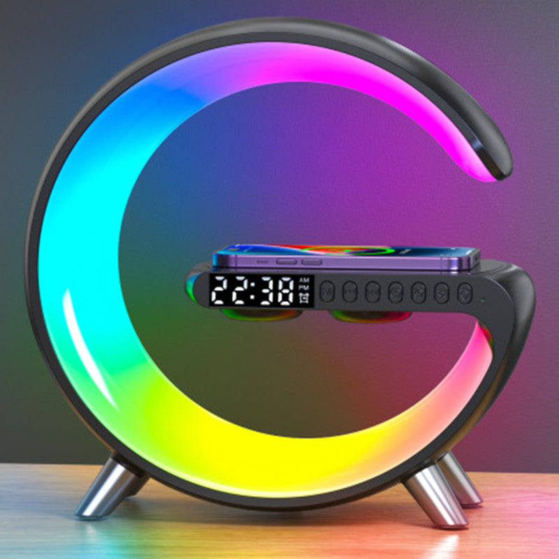 G-Shape LED lamp with built-in Bluetooth speaker and wireless charger